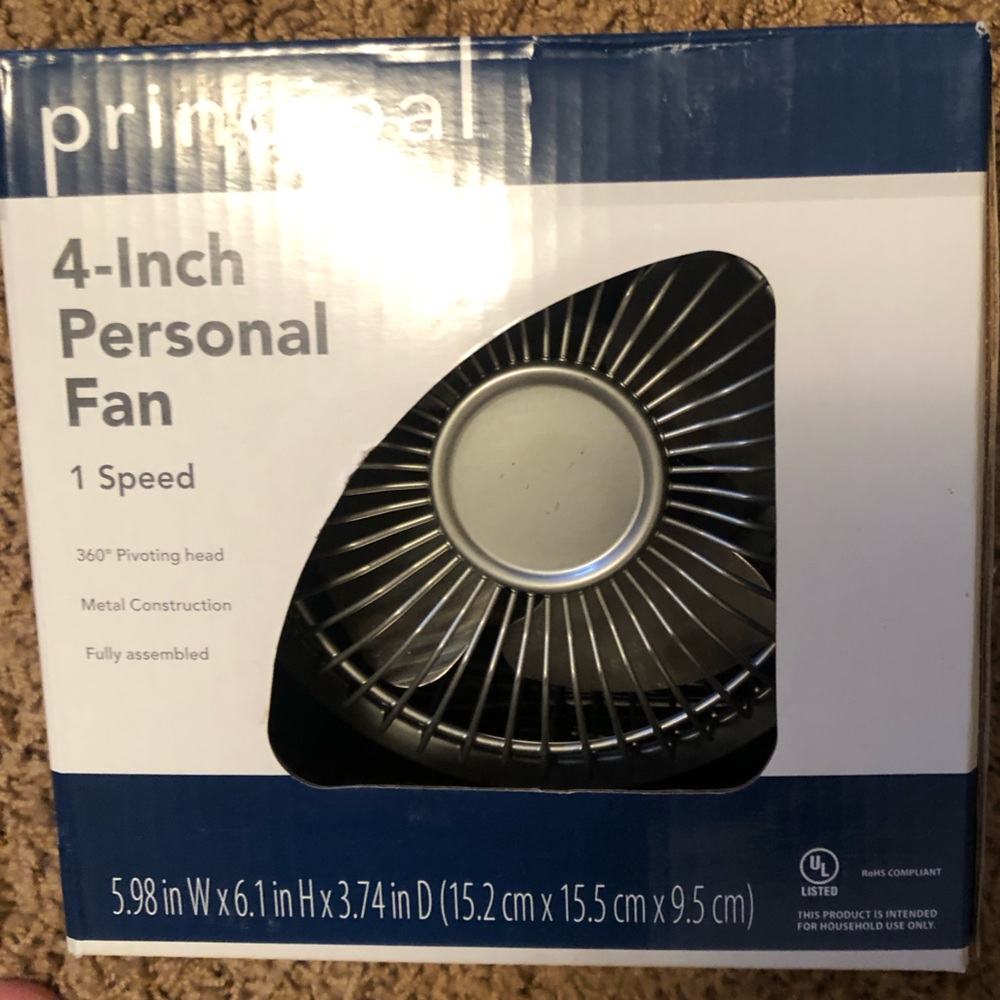 Never opened personal fan in box
